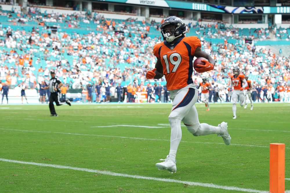 Denver Broncos wide receiver Marvin Mims Jr. (19) returns a kick-off for a touchdown in the second half during the game between the Denver Broncos and the Miami Dolphins on Sunday, September 24, 2023 at Hard Rock Stadium, Miami, Fla.