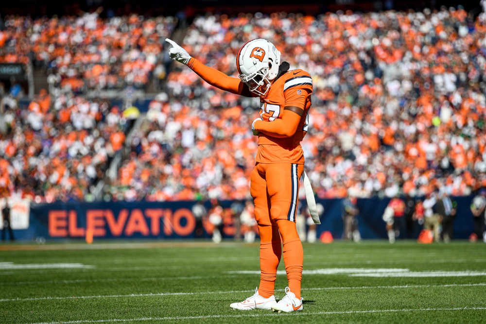 Denver Broncos cornerback Riley Moss (37) celebrates after defending a pass in the first quarter during a game between the New York Jets and the Denver Broncos at Empower Field at Mile High on October 8, 2023 in Denver, Colorado.