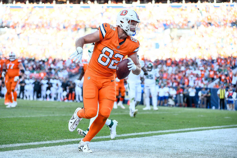Denver Broncos tight end Adam Trautman (82) scores a fourth quarter touchdown during a game between the New York Jets and the Denver Broncos at Empower Field at Mile High on October 8, 2023 in Denver, Colorado.
