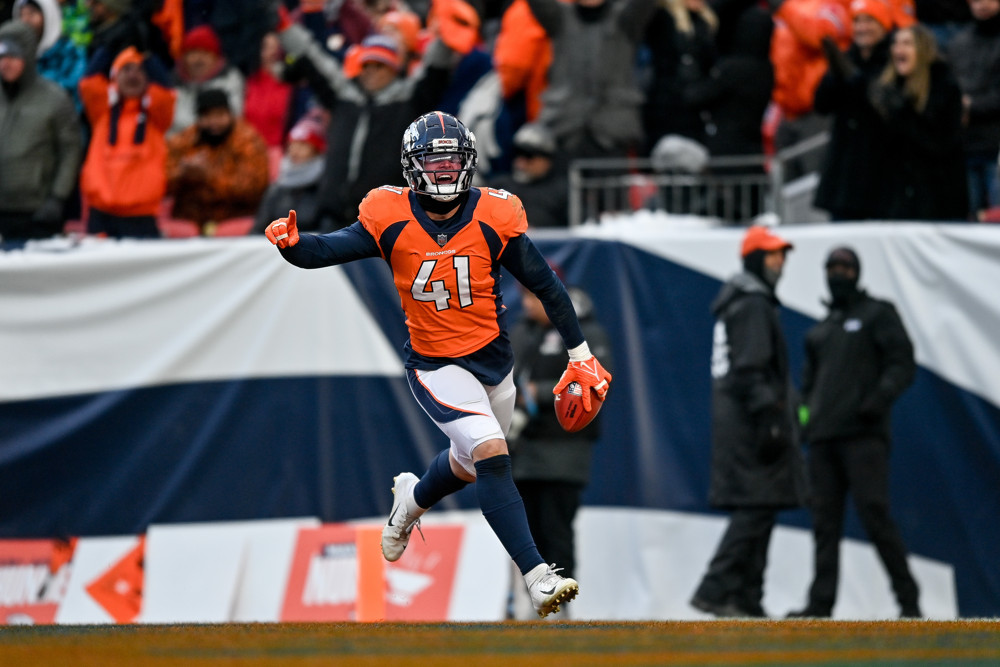 Denver Broncos linebacker Drew Sanders (41) celebrates after recovering the ball on a botched punt return by the Kansas City Chiefs in the fourth quarter during a game at Empower Field at Mile High on October 29, 2023 in Denver, Colorado.