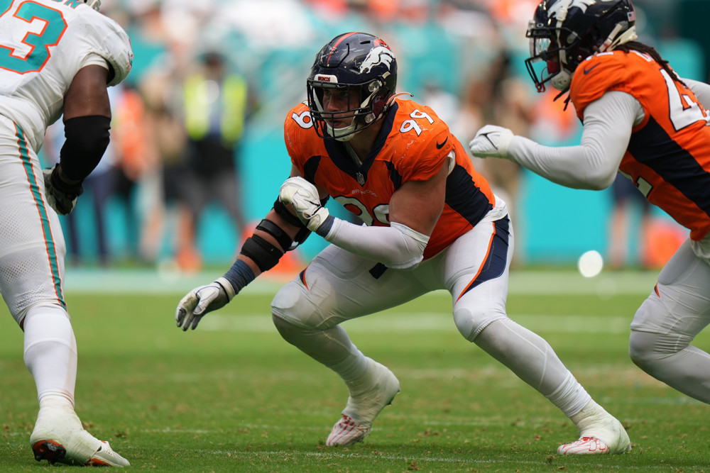 Denver Broncos defensive end Zach Allen (99) rushes the passer in the second half during the game between the Denver Broncos and the Miami Dolphins on Sunday, September 24, 2023 at Hard Rock Stadium, Miami, Fla.