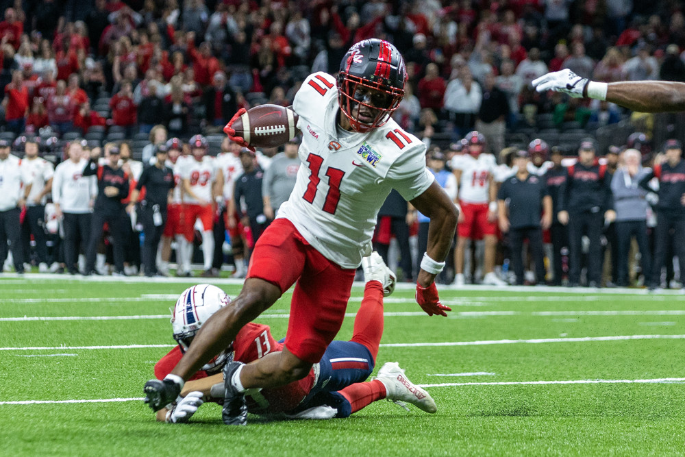 Western Kentucky Hilltoppers wide receiver Malachi Corley (11) scores a touchdown during a game between the Western Kentucky Hilltoppers and the South Alabama Jaguars at the Ceasars Superdome in New Orleans, Louisiana 