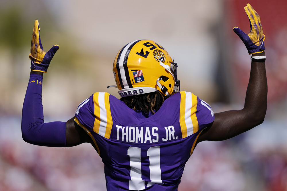LSU Tigers wide receiver Brian Thomas Jr. (11) celebrates during the ReliaQuest Bowl against the Wisconsin Badgers on January 1, 2024 at Raymond James Stadium in Tampa, Florida.