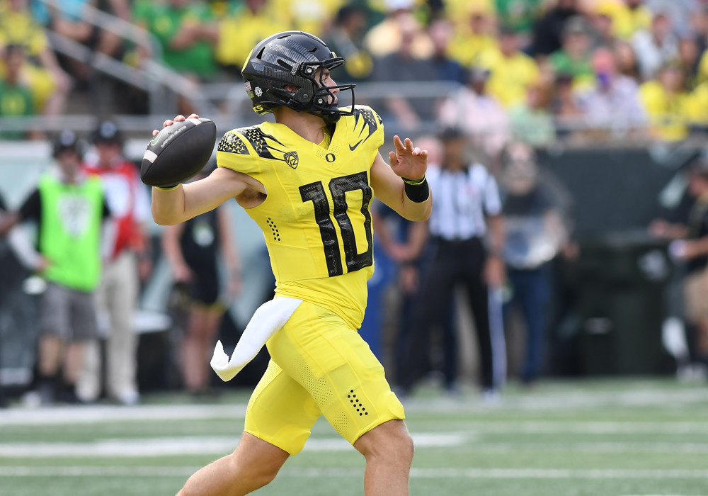 Denver Broncos quarterback Bo Nix (10) throws on the run during a college football game between the Oregon Ducks and Portland State Vikings on September 2, 2023, at Autzen Stadium in Eugene, Oregon. (Photo by Brian Murphy/Icon Sportswire)