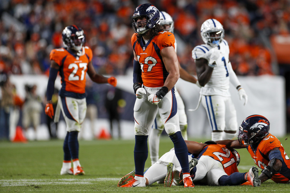 Denver Broncos linebacker Alex Singleton (49) celebrates during an NFL game between the Indianapolis Colts and the Denver Broncos at Empower Field at Mile High on October 06, 2022 in Denver, Colorado.