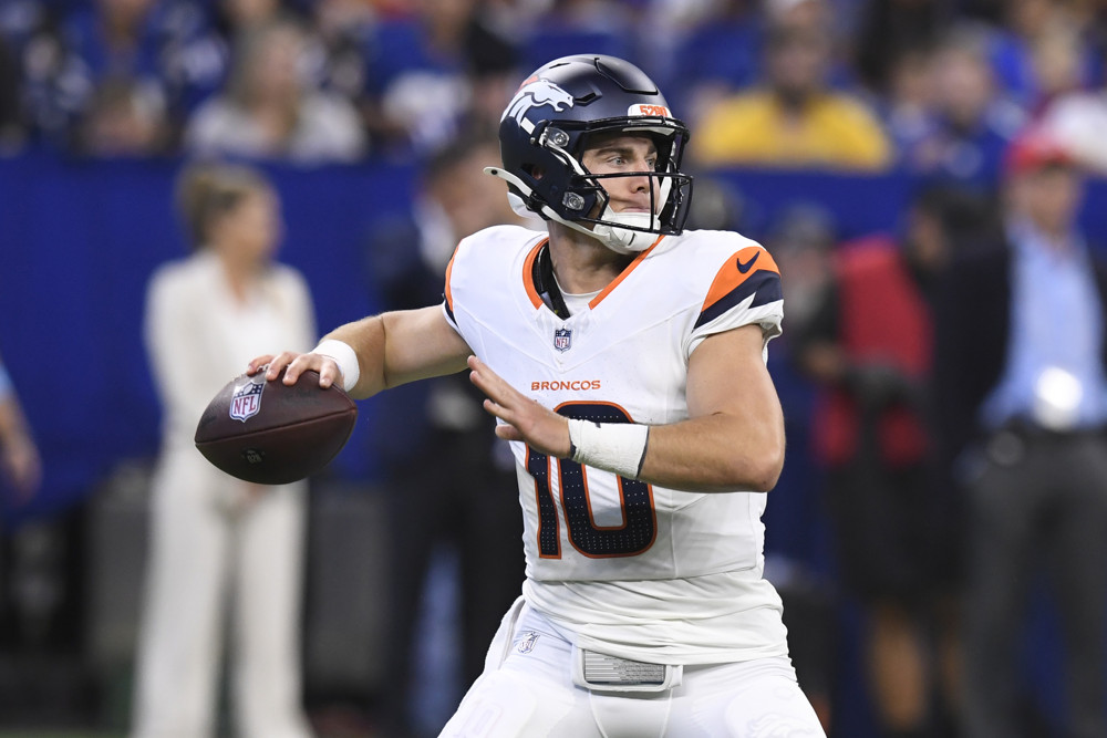 Denver Broncos Quarterback Bo Nix (10) passes during the NFL Preseason game between the Denver Broncos and the Indianapolis Colts on August 11, 2024, at Lucas Oil Stadium in Indianapolis, Indiana.