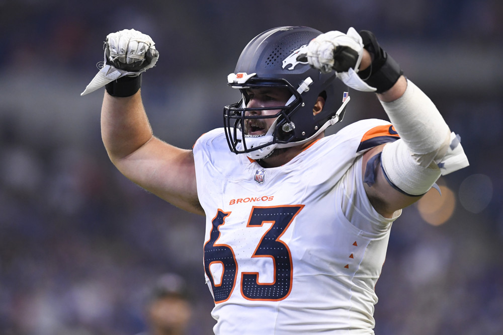 Denver Broncos Tackle Alex Palczewski (63) reacts during the NFL Preseason game between the Denver Broncos and the Indianapolis Colts on August 11, 2024, at Lucas Oil Stadium in Indianapolis, Indiana.