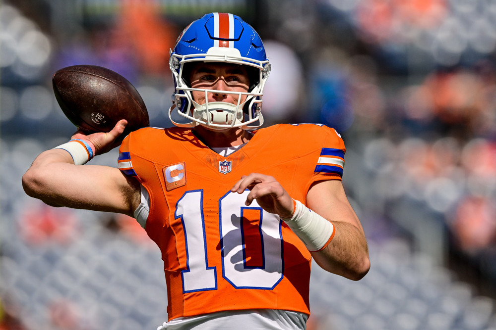 Denver Broncos quarterback Bo Nix (10) warms up before a game between the Las Vegas Raiders and the Denver Broncos at Empower Field at Mile High on October 6, 2024 in Denver, Colorado.