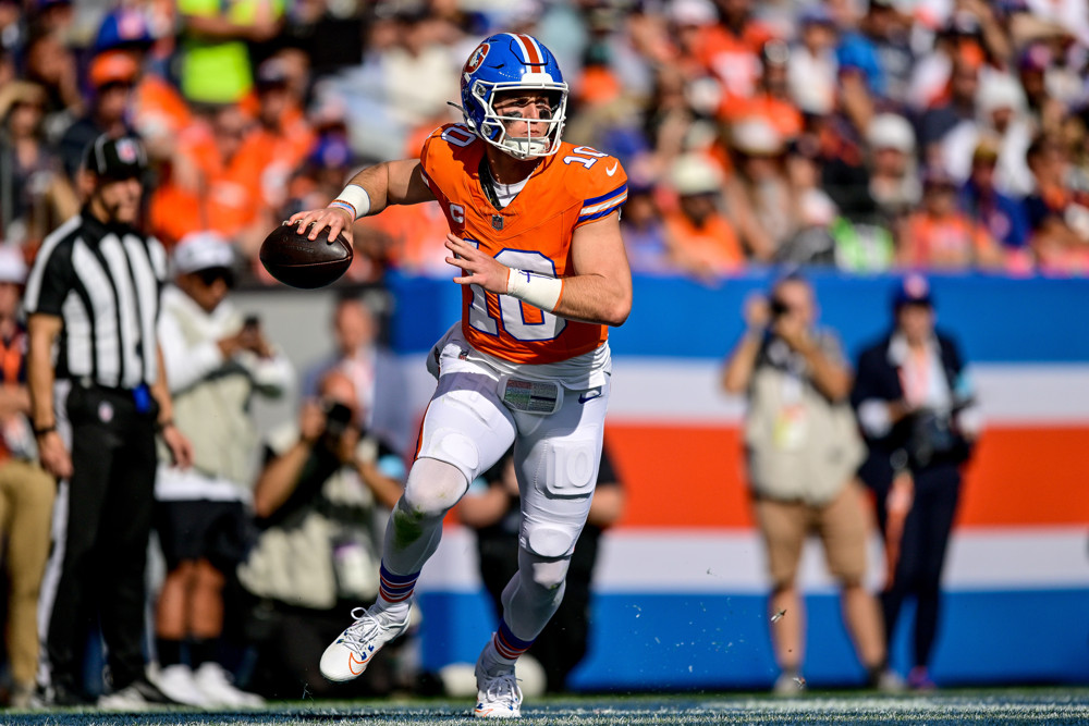 Denver Broncos quarterback Bo Nix (10) looks downfield during a game between the Las Vegas Raiders and the Denver Broncos at Empower Field at Mile High on October 6, 2024 in Denver, Colorado.