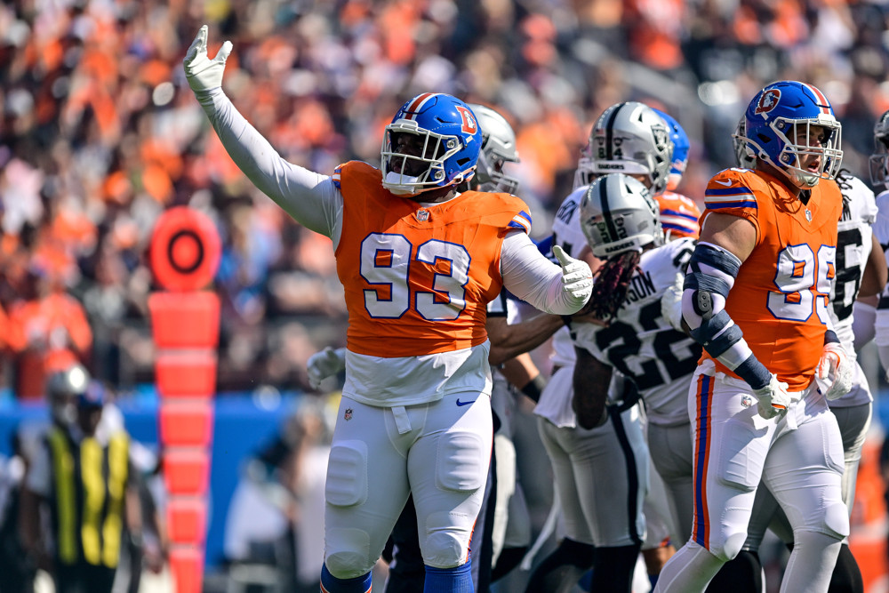 Denver Broncos defensive tackle D.J. Jones (93) celebrates after a tackle for a loss in the first quarter during a game between the Las Vegas Raiders and the Denver Broncos at Empower Field at Mile High on October 6, 2024 in Denver, Colorado.