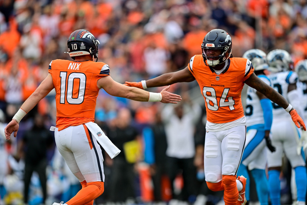 Denver Broncos quarterback Bo Nix (10) and wide receiver Lil'Jordan Humphrey (84) celebrate after a second quarter touchdown during a game between the Carolina Panthers and the Denver Broncos at Empower Field at Mile High on October 27, 2024 in Denver, Colorado.