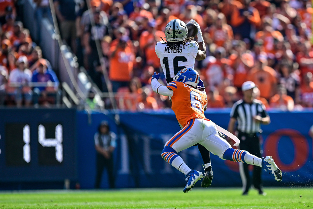 Denver Broncos safety P.J. Locke (6) defends a pass against Las Vegas Raiders wide receiver Jakobi Meyers (16) during a game between the Las Vegas Raiders and the Denver Broncos at Empower Field at Mile High on October 6, 2024 in Denver, Colorado. 