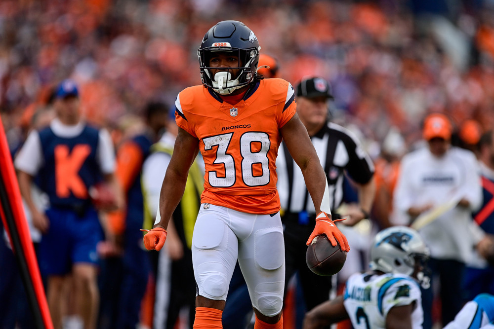 Denver Broncos running back Jaleel McLaughlin (38) celebrates after gaining for a first down in the second quarter during a game between the Carolina Panthers and the Denver Broncos at Empower Field at Mile High on October 27, 2024 in Denver, Colorado.