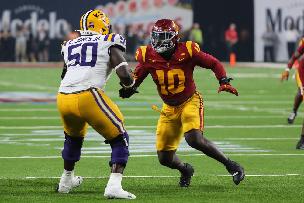 LSU Tigers offensive lineman Emery Jones Jr. (50) on his heels from USC Trojans defensive end Jamil Muhammad (10) pass rush during the Modelo Vegas Kickoff Classic featuring the USC Trojans versus the LSU Tigers on September 1, 2024 at Allegiant Stadium in Las Vegas, Nevada.