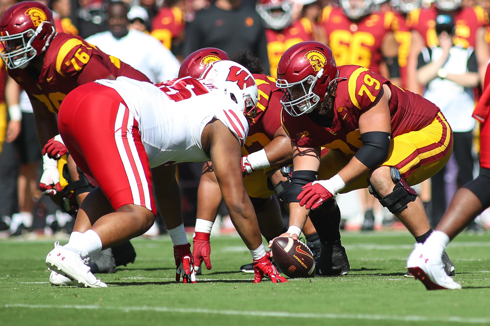 USC Trojans offensive lineman Jonah Monheim (79) looks to snap during the Wisconsin Badgers vs USC Trojans game on September 28, 2024, at the Los Angeles Memorial Coliseum in Los Angeles, CA.