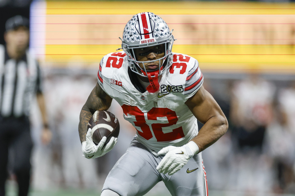 Running Back TreVeyon Henderson #32 of the Ohio State Buckeyes runs with the ball during the Ohio State Buckeyes versus Notre Dame Fighting Irish College Football Playoff National Championship game on January 20, 2025, at Mercedes-Benz Stadium in Atlanta, GA.