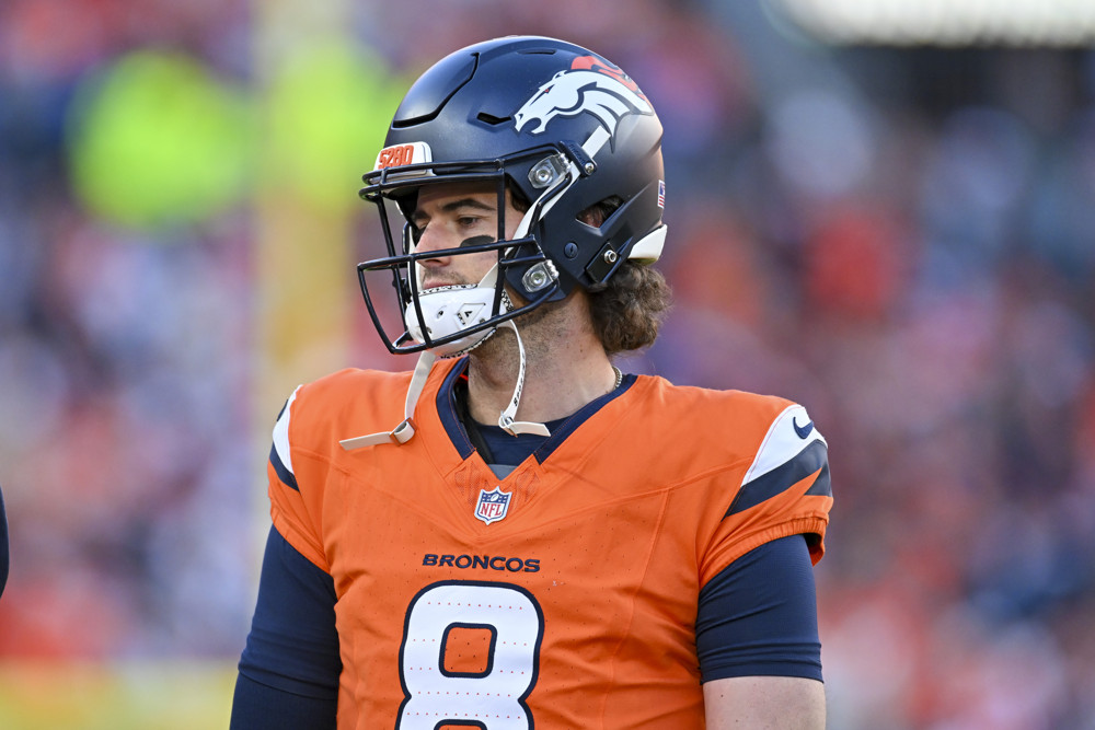 Denver quarterback Jarrett Stidham (8) during a game between the Indianapolis Colts and the Denver Broncos at Empower Field at Mile High in Denver, CO on December 15, 2024.