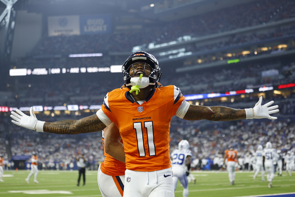 Denver Broncos wide receiver Troy Franklin (11) celebrates his touchdown during an NFL game between the Denver Broncos and the Indianapolis Colts on September 14, 2025 at Lucas Oil Stadium in Indianapolis, IN.