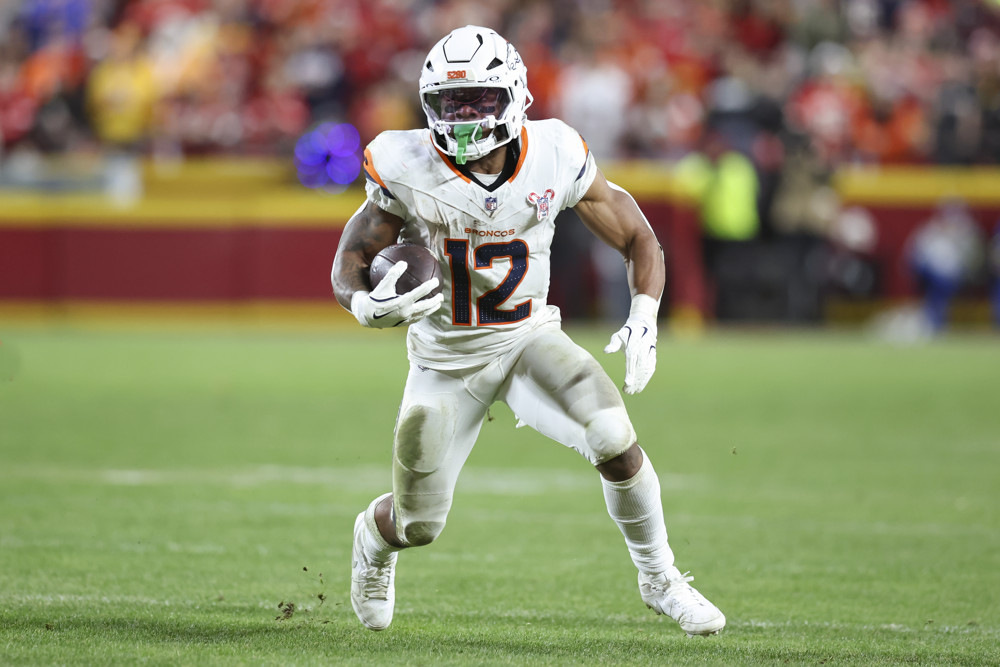 Denver Broncos running back RJ Harvey (12) runs with the ball in the third quarter of a Christmas Day NFL game between the Denver Broncos and Kansas City Chiefs on December 25, 2025 at GEHA Field at Arrowhead Stadium in Kansas City, MO.