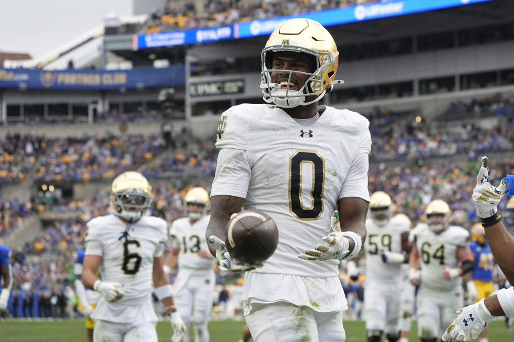 Notre Dame Fighting Irish Wide Receiver Malachi Fields (0) reacts to scoring a touchdown during the second half of the College Football game between the Notre Dame Fighting Irish and the Pittsburgh Panthers on November 15, 2025, at Acrisure Stadium in Pittsburgh, PA.