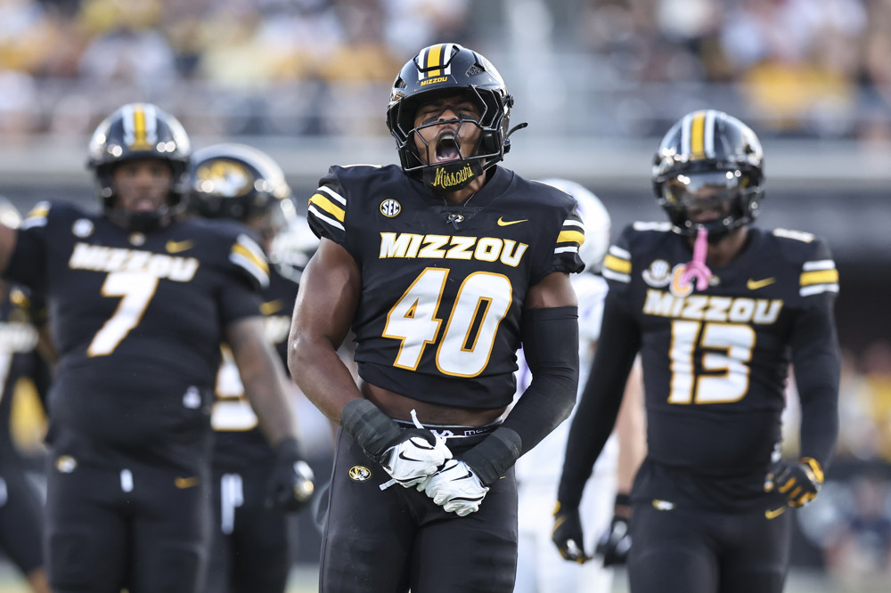 Missouri Tigers linebacker Josiah Trotter (40) yells to celebrate a stop on third down in the first quarter of a college football game between the Central Arkansas Bears and Missouri Tigers on August 28, 2025 at Memorial Stadium in Columbia, MO.